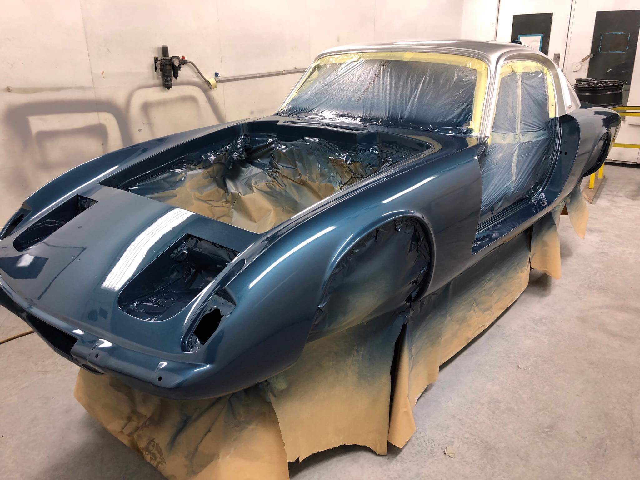 Classic vehicle body undergoing restoration at Sixteen80